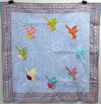 Click here for more information about Origami Birds, Lap Quilt; 46" x 46";  Farmhouse Community Quilters,  Value $ 125